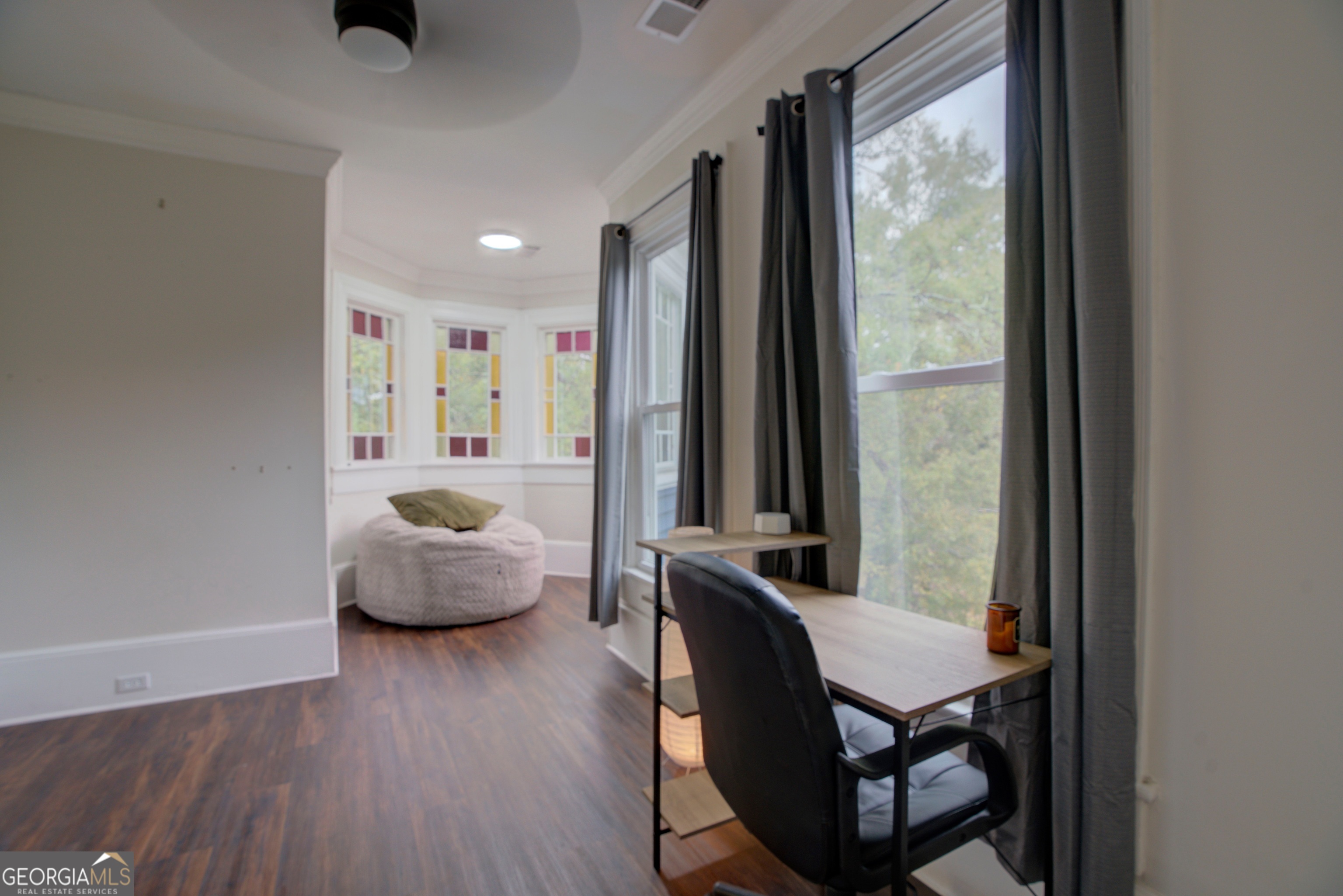 232 South Broad Street Rome, GA 30161 - Photo 28 of 37 a living room with furniture and a large window