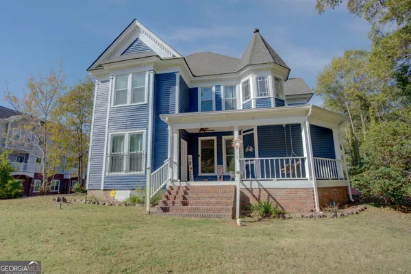 front view of a house with a yard
