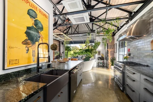 a kitchen with a sink and cabinets