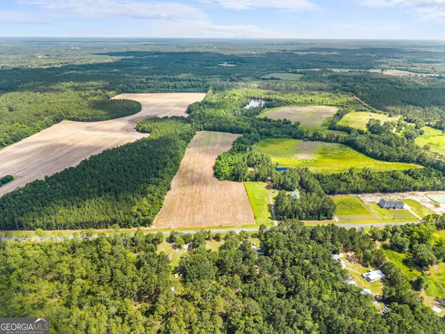 a view of a lake with a big yard