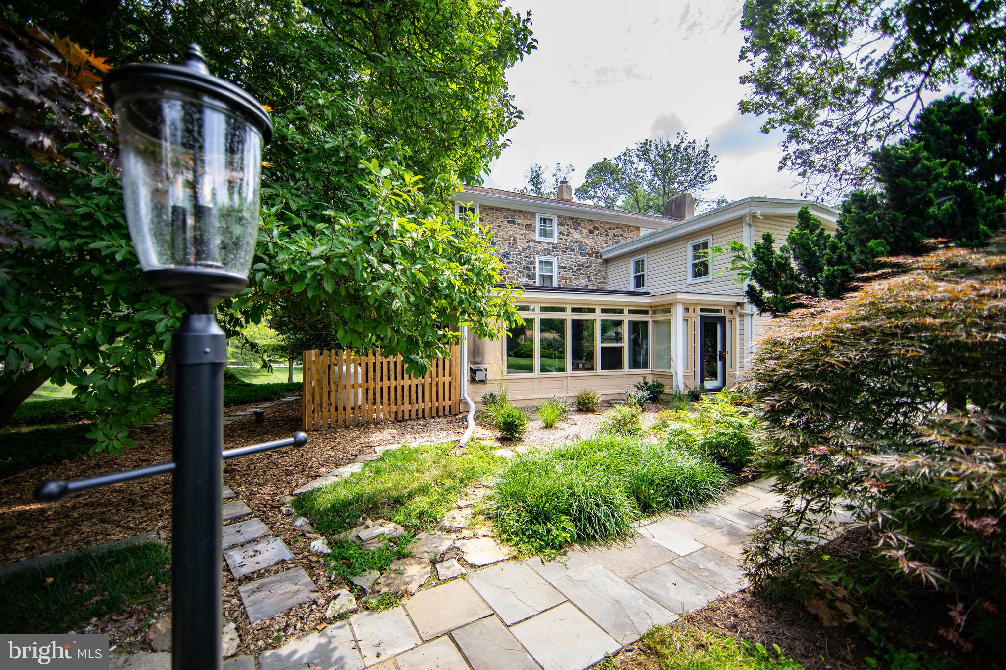 363 Valleybrook Road Glen Mills, PA 19342 - Photo 16 of 110 Rear view of home with hardscape walkway