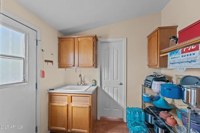 a room that has a bed and a dresser in it