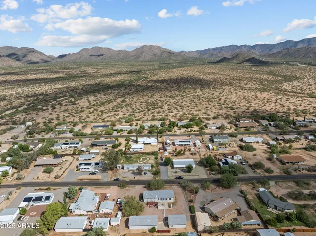 a view of a city with mountains in the background