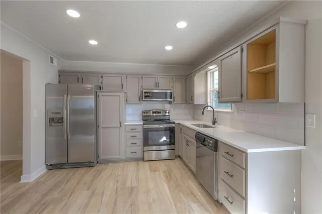 $319,000 | 313 Southeast Onyx Court, Lee's Summit, MO 64063