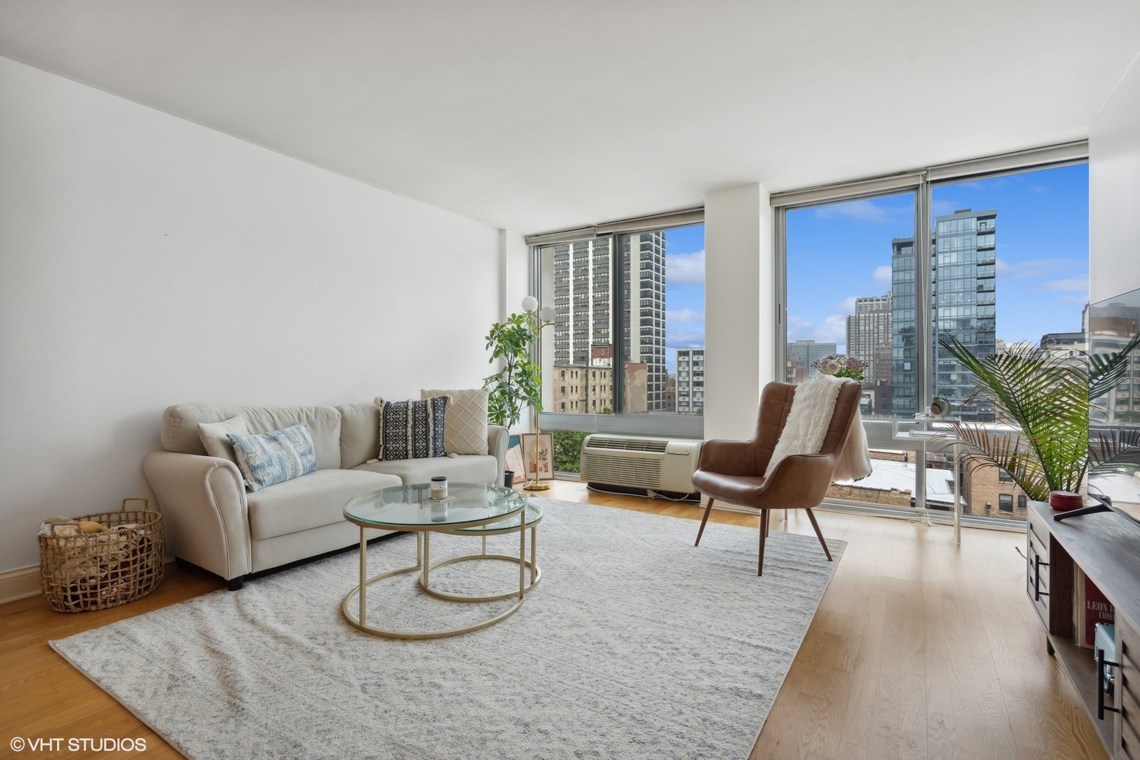 450 West Briar Place, Unit 7B Chicago, IL 60657 - Photo 3 of 15 a living room with furniture and a large window