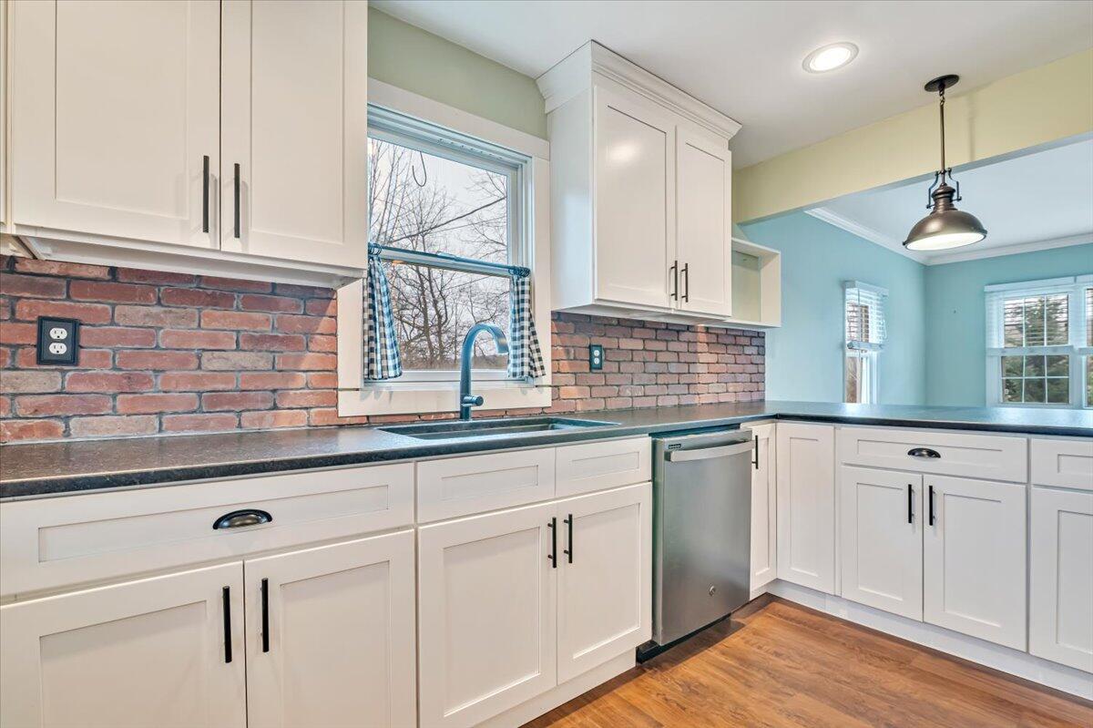 5039 Running Valley Road Stroudsburg, PA 18360 - Photo 21 of 65 a kitchen with white cabinets and a window