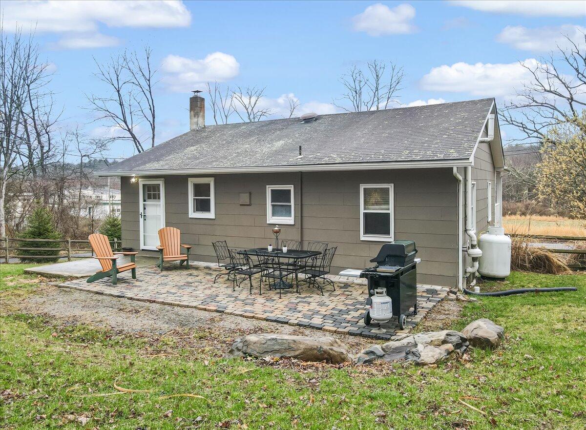 5039 Running Valley Road Stroudsburg, PA 18360 - Photo 42 of 65 a front view of house with yard and seating