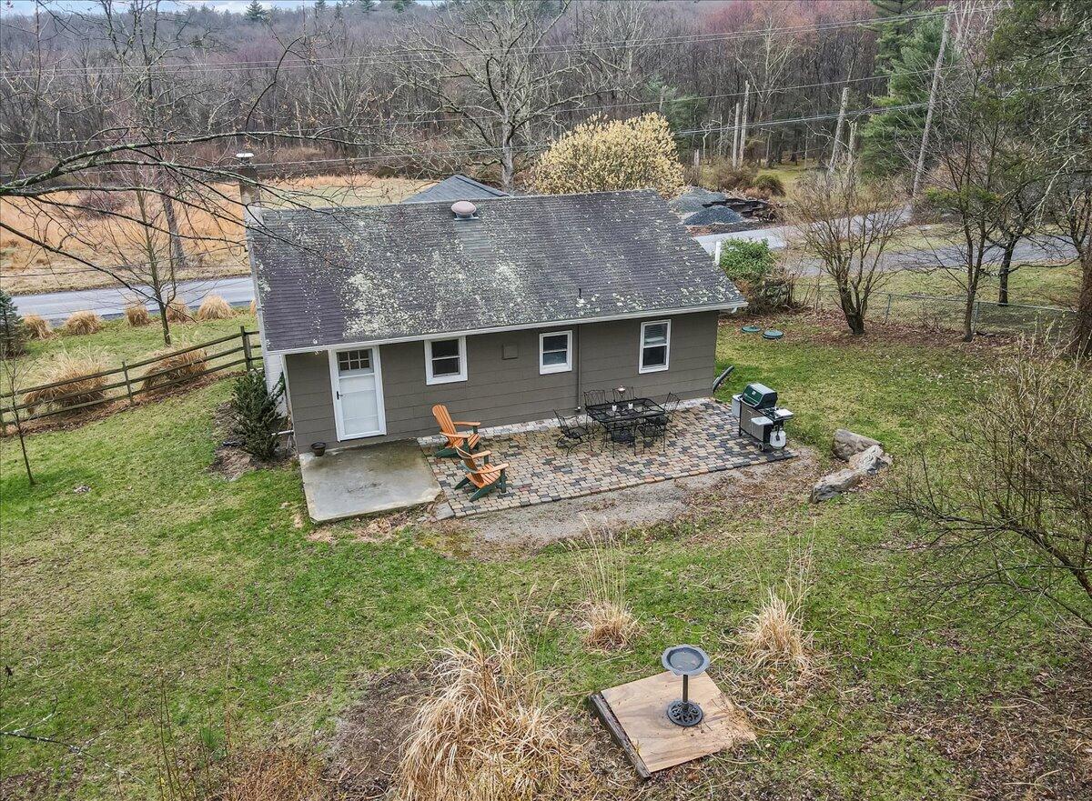 5039 Running Valley Road Stroudsburg, PA 18360 - Photo 43 of 65 a front view of house with yard and trees