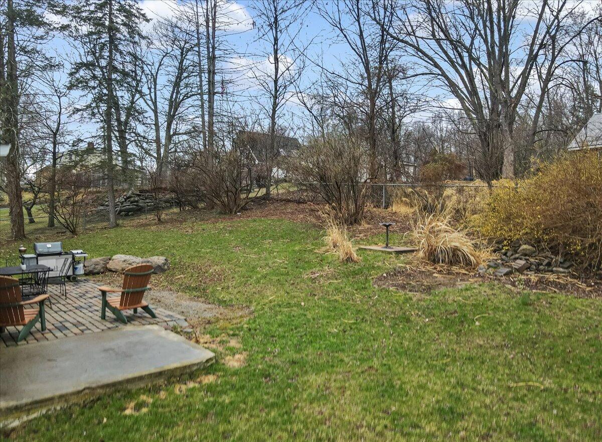 5039 Running Valley Road Stroudsburg, PA 18360 - Photo 44 of 65 a view of a yard with table and chairs