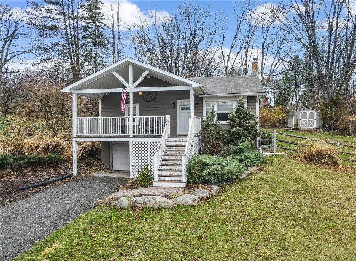 5039 Running Valley Road Stroudsburg, PA 18360 - Photo 57 of 65 a front view of house with yard and green space