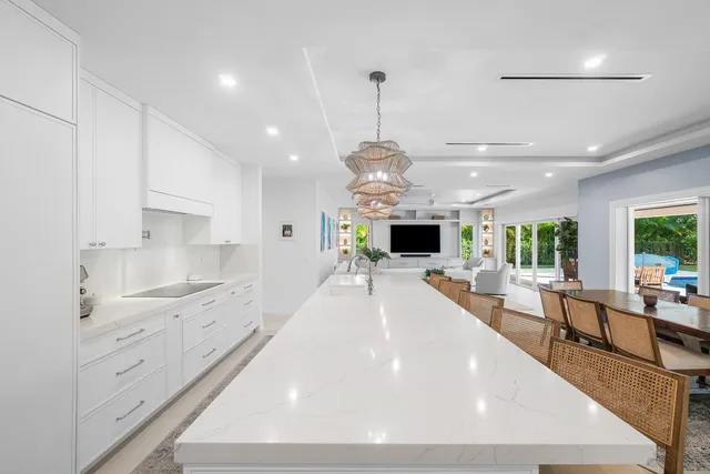 a utility room with sink dryer and washer