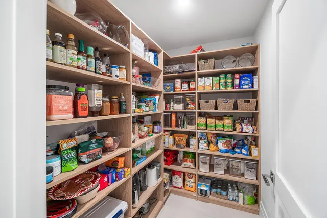 a view of a backyard with swimming pool