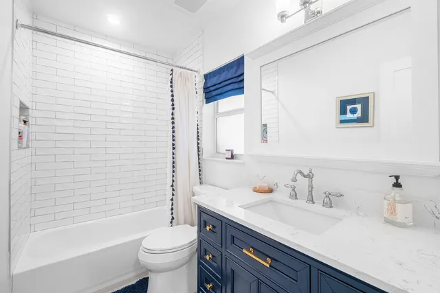 a aerial view of a house with a yard