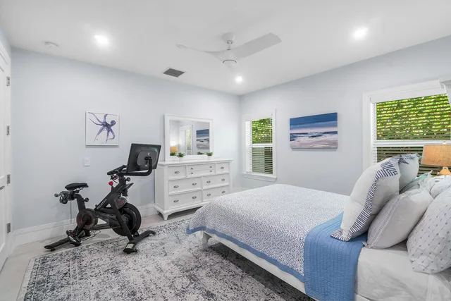 an aerial view of a house with a yard and a garden