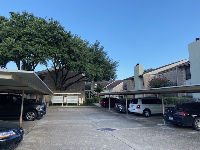 8100 Cambridge Street, Unit 40 Houston, TX 77054 - Photo 12 of 15 a car parked in front of house