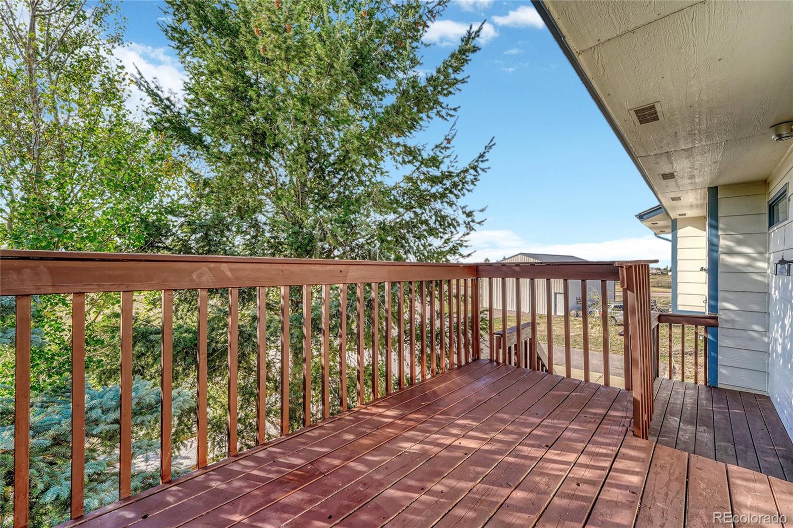 2460 Eileen Way Parker, CO 80138 - Photo 31 of 47 a view of a wooden fence