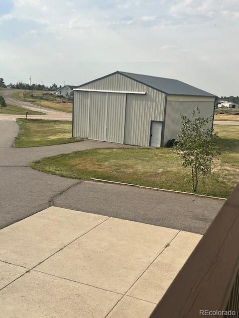 2460 Eileen Way Parker, CO 80138 - Photo 44 of 47 a view of a backyard of the house
