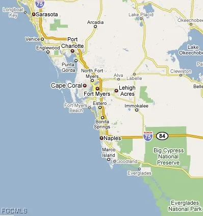 a close up of a wall with a bunch of graffiti on it