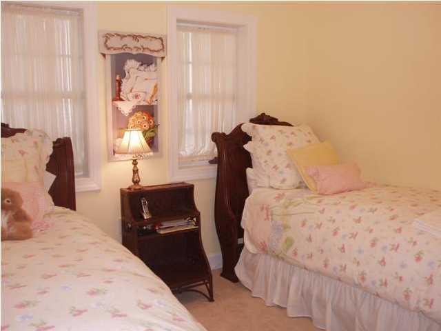 10343 East County Hwy Inlet Beach, Unit 220F 30A Inlet Beach, FL 32413 - Photo 11 of 15 a bedroom with a bed and a window