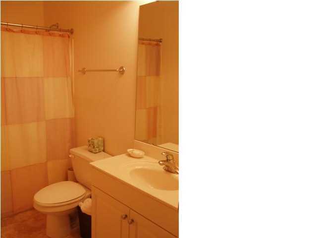 10343 East County Hwy Inlet Beach, Unit 220F 30A Inlet Beach, FL 32413 - Photo 12 of 15 a bathroom with a sink and a toilet
