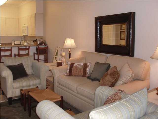 10343 East County Hwy Inlet Beach, Unit 220F 30A Inlet Beach, FL 32413 - Photo 7 of 15 a living room with furniture and a lamp