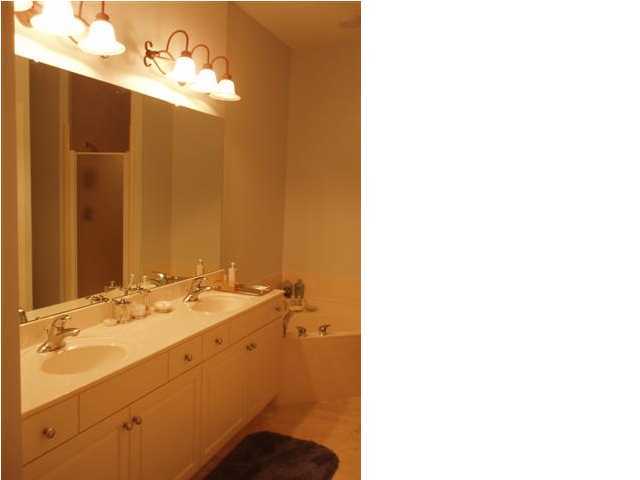 10343 East County Hwy Inlet Beach, Unit 220F 30A Inlet Beach, FL 32413 - Photo 10 of 15 a bathroom with a sink and a mirror