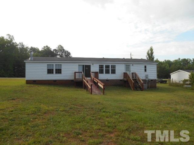 11366 Old Us 64 Spring Spring Hope, NC 27882 - Photo 2 of 12 a view of a house with a backyard