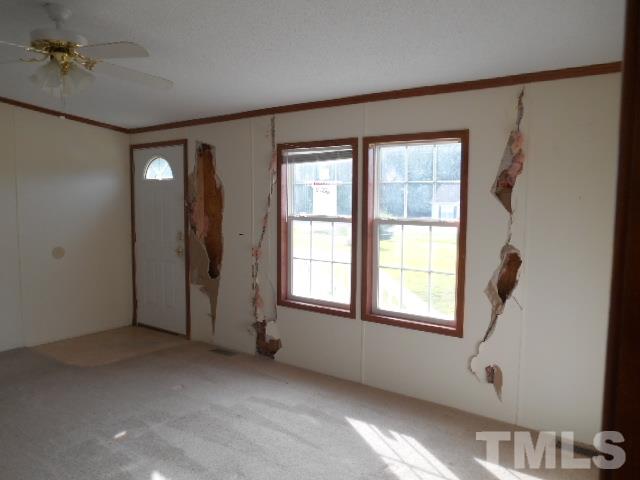 11366 Old Us 64 Spring Spring Hope, NC 27882 - Photo 4 of 12 a view of empty room with windows