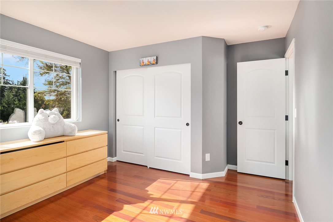 4532 Northeast 10th Street Renton, WA 98059 - Photo 19 of 24 a living room with hard wood floors and a window