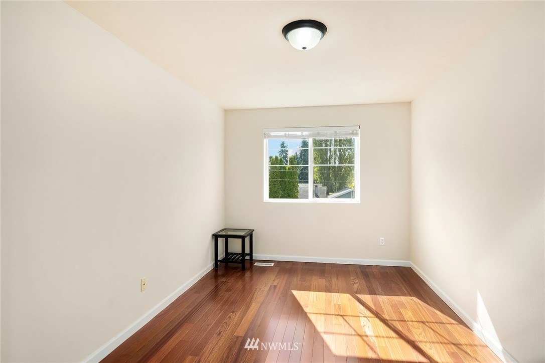 4532 Northeast 10th Street Renton, WA 98059 - Photo 21 of 24 an empty room with a window