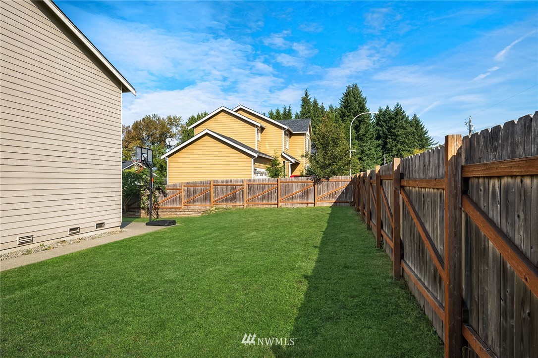 4532 Northeast 10th Street Renton, WA 98059 - Photo 24 of 24 a view of a backyard with a garden