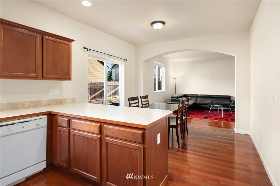4532 Northeast 10th Street Renton, WA 98059 - Photo 7 of 24 a kitchen with a sink and cabinets