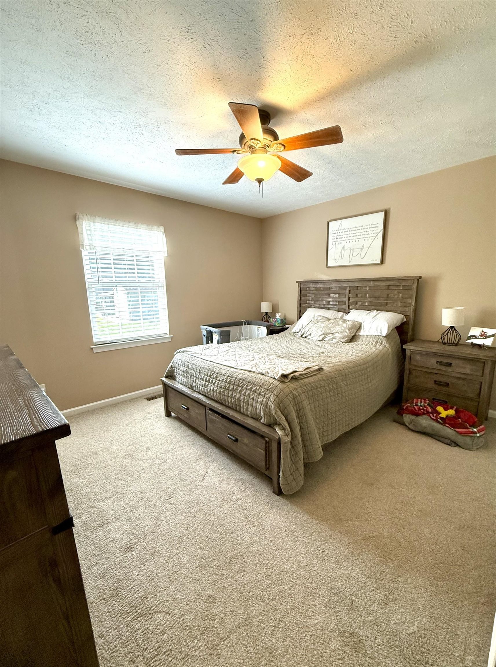 10909 Cook Town Road Bridgewater, VA 22812 - Photo 12 of 23 a bedroom with bed and a chandelier