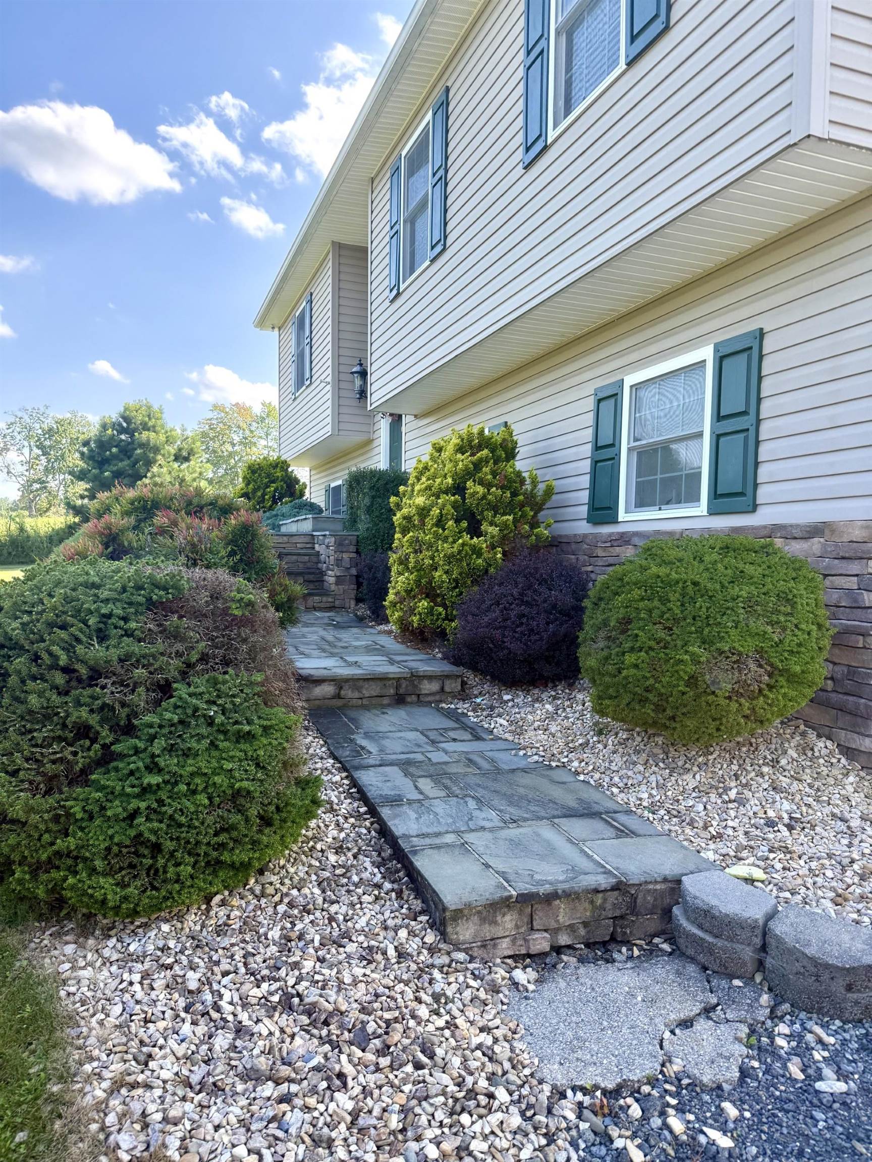 10909 Cook Town Road Bridgewater, VA 22812 - Photo 2 of 23 a front view of a house with garden