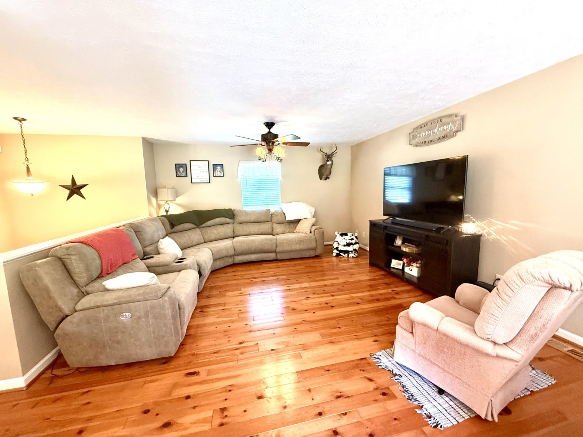 10909 Cook Town Road Bridgewater, VA 22812 - Photo 5 of 23 a living room with furniture and a flat screen tv