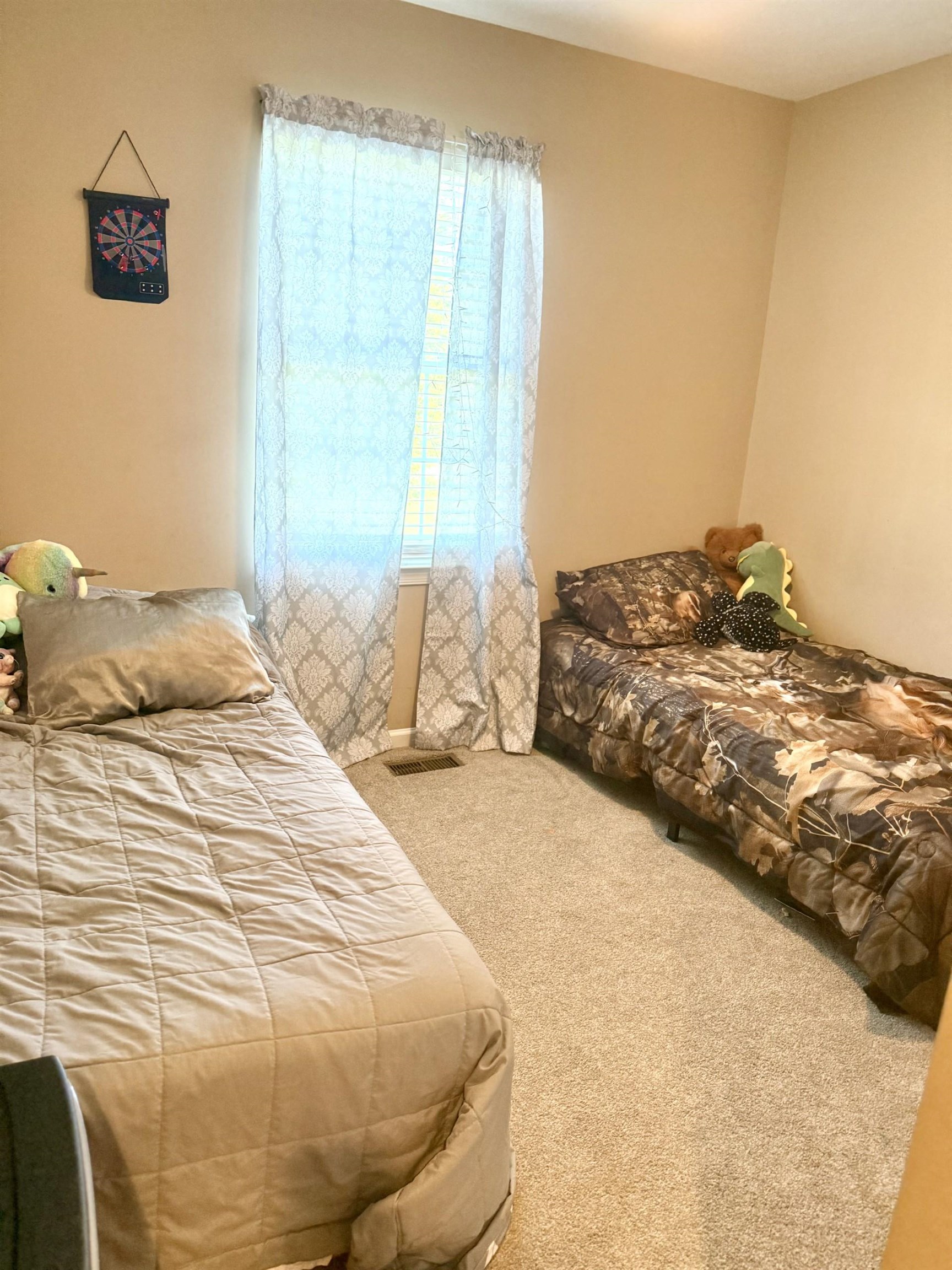 10909 Cook Town Road Bridgewater, VA 22812 - Photo 10 of 23 a bedroom with a bed and a window