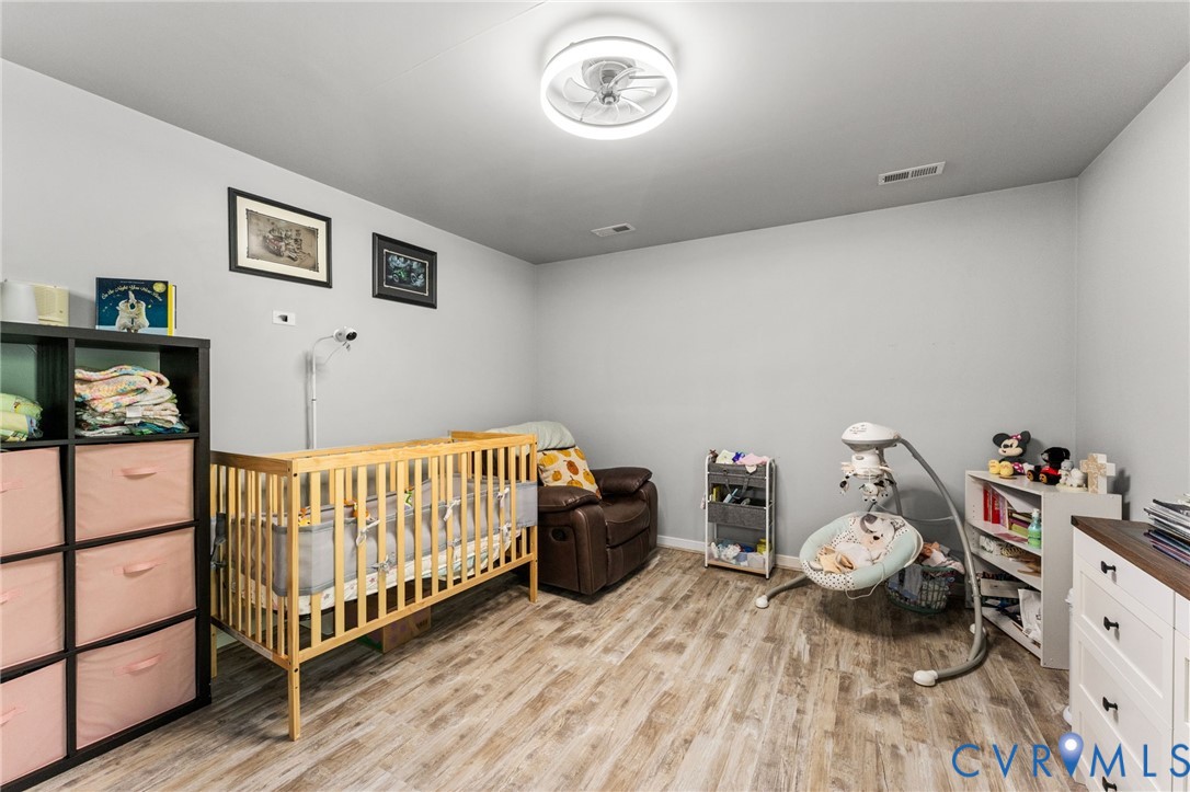 3120 Denise Road Petersburg, VA 23805 - Photo 40 of 51 Spacious room featuring wood-finish flooring, ligh