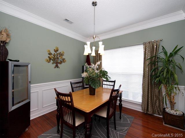 919 Knightsbridge Road Fort Mill, SC 29708 - Photo 2 of 24 a view of a dining room with furniture window and wooden floor