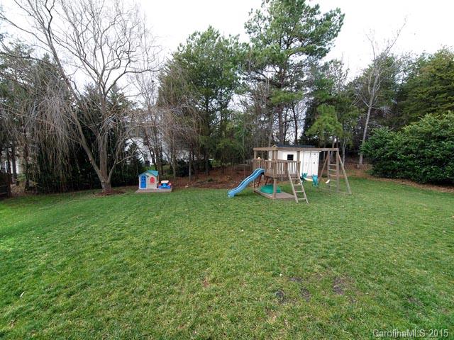 919 Knightsbridge Road Fort Mill, SC 29708 - Photo 17 of 24 a view of a yard with a slide