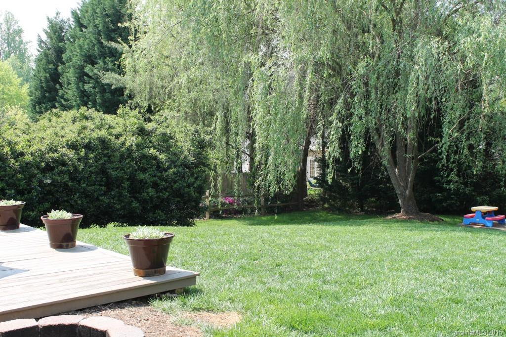 919 Knightsbridge Road Fort Mill, SC 29708 - Photo 19 of 24 a view of a garden with a sitting area