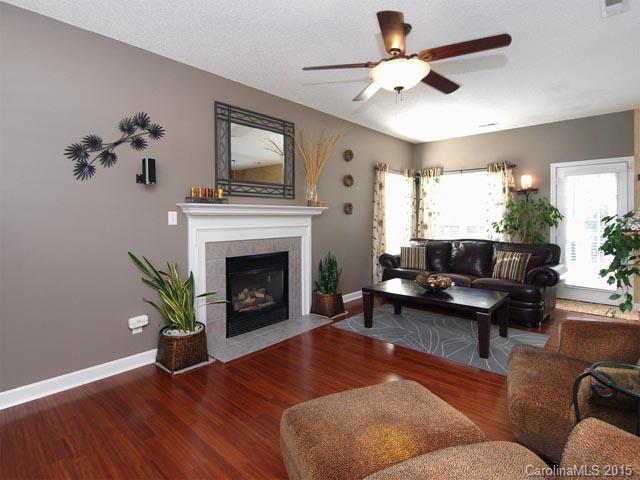 919 Knightsbridge Road Fort Mill, SC 29708 - Photo 3 of 24 a living room with furniture and a fireplace