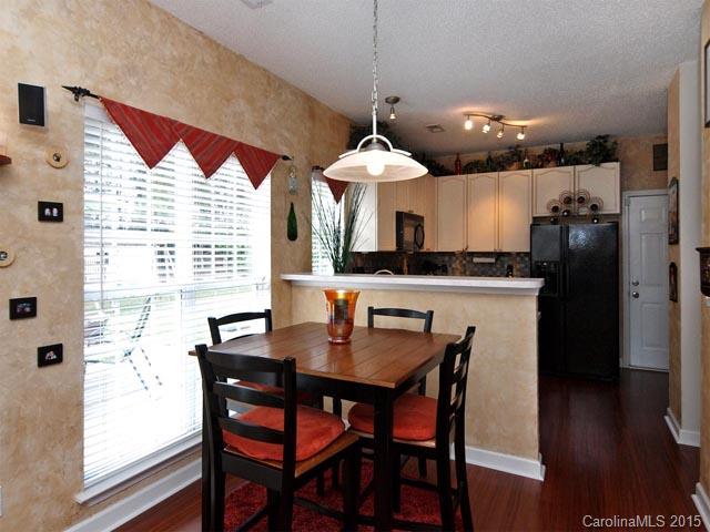 919 Knightsbridge Road Fort Mill, SC 29708 - Photo 8 of 24 a kitchen with a table and chairs in it