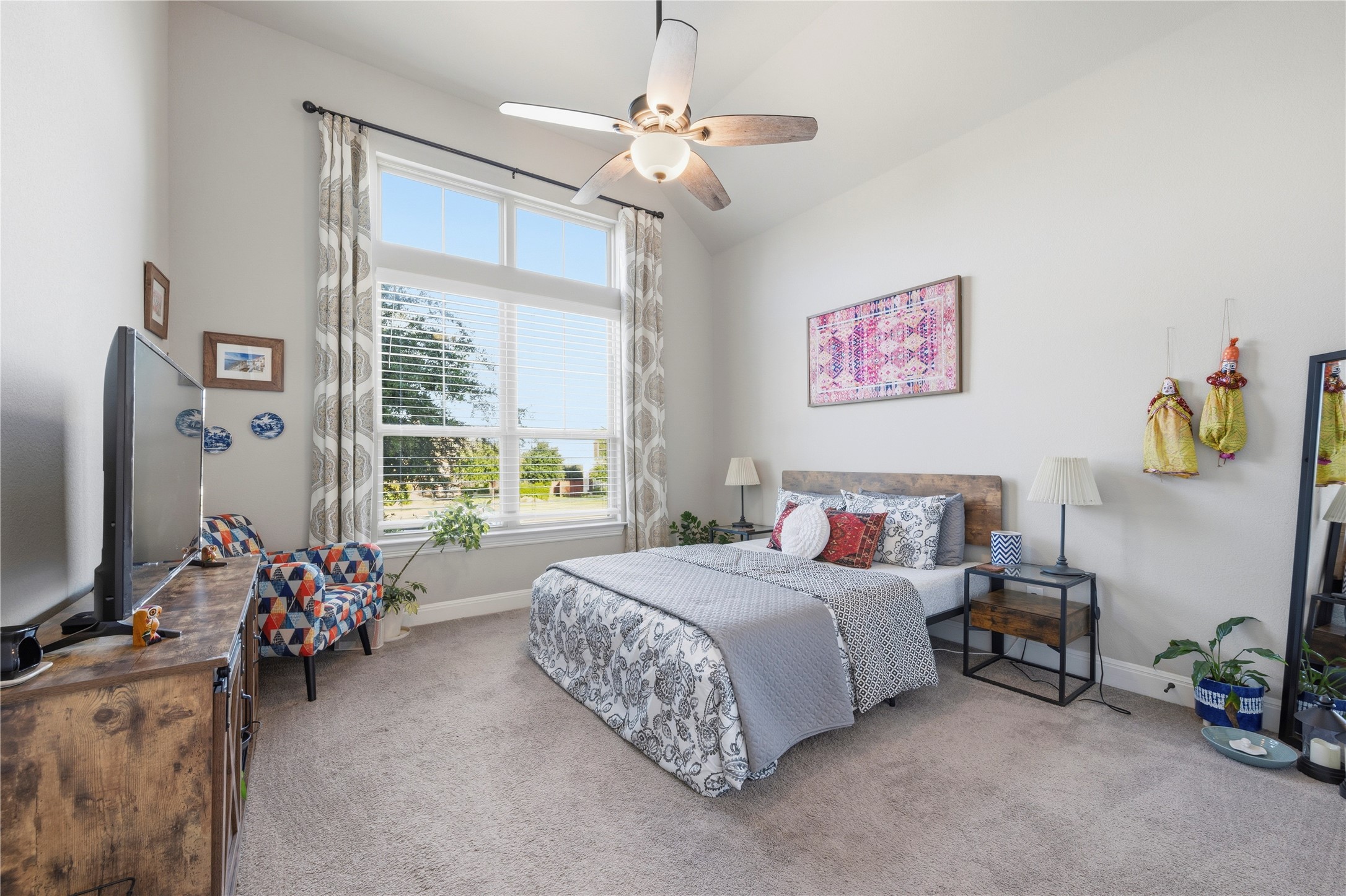 138 Rpd Spgs Cove Georgetown, TX 78628 - Photo 14 of 37 a bedroom with bed and a window