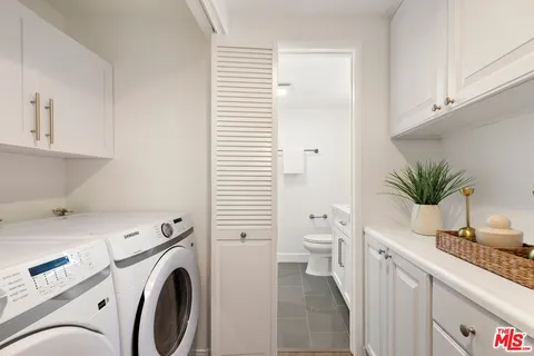 a view of bathroom with a toilet and a sink