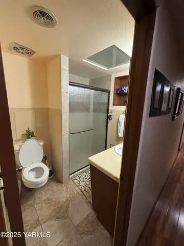 a bathroom with a sink and toilet