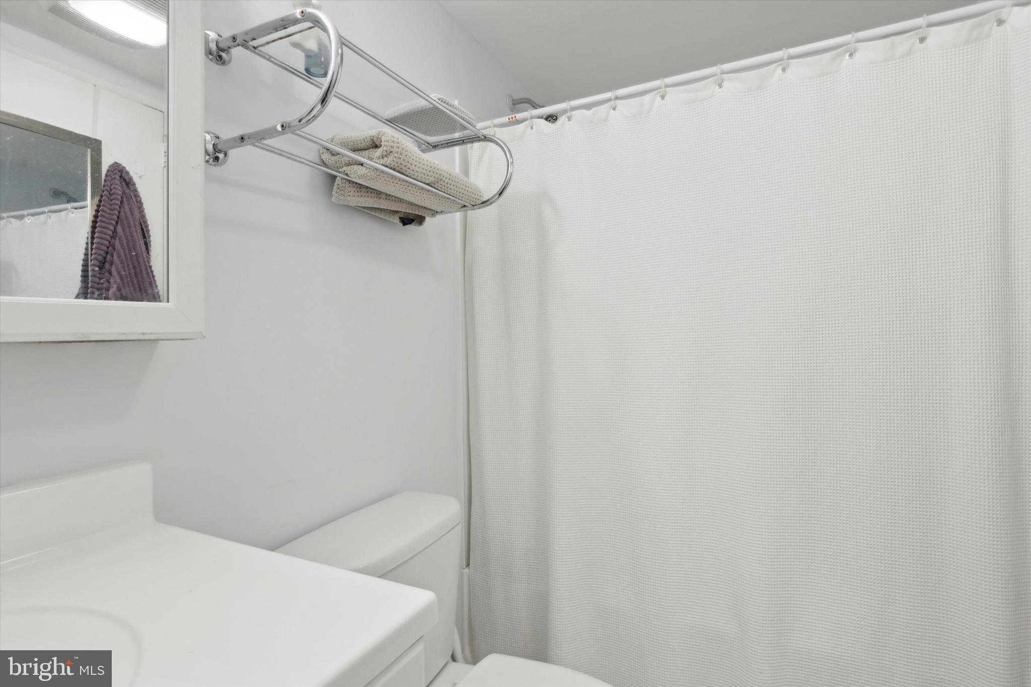 2001 Hamilton Street, Unit 521 Philadelphia, PA 19130 - Photo 14 of 27 a bathroom with a bathtub and shower
