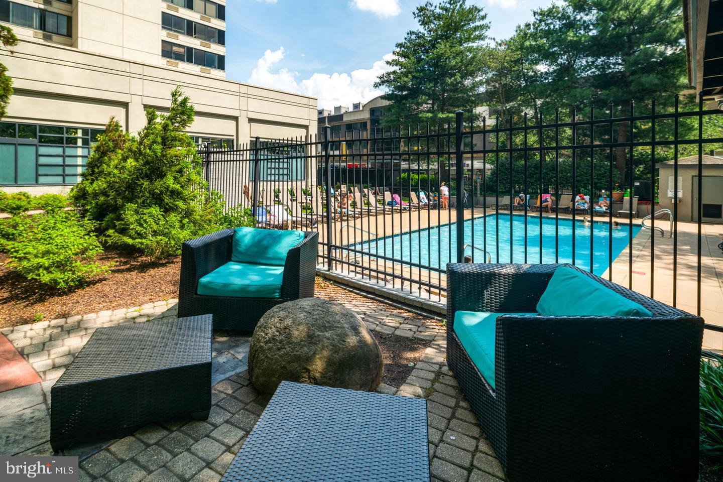2001 Hamilton Street, Unit 521 Philadelphia, PA 19130 - Photo 18 of 27 a view of a deck with a bench