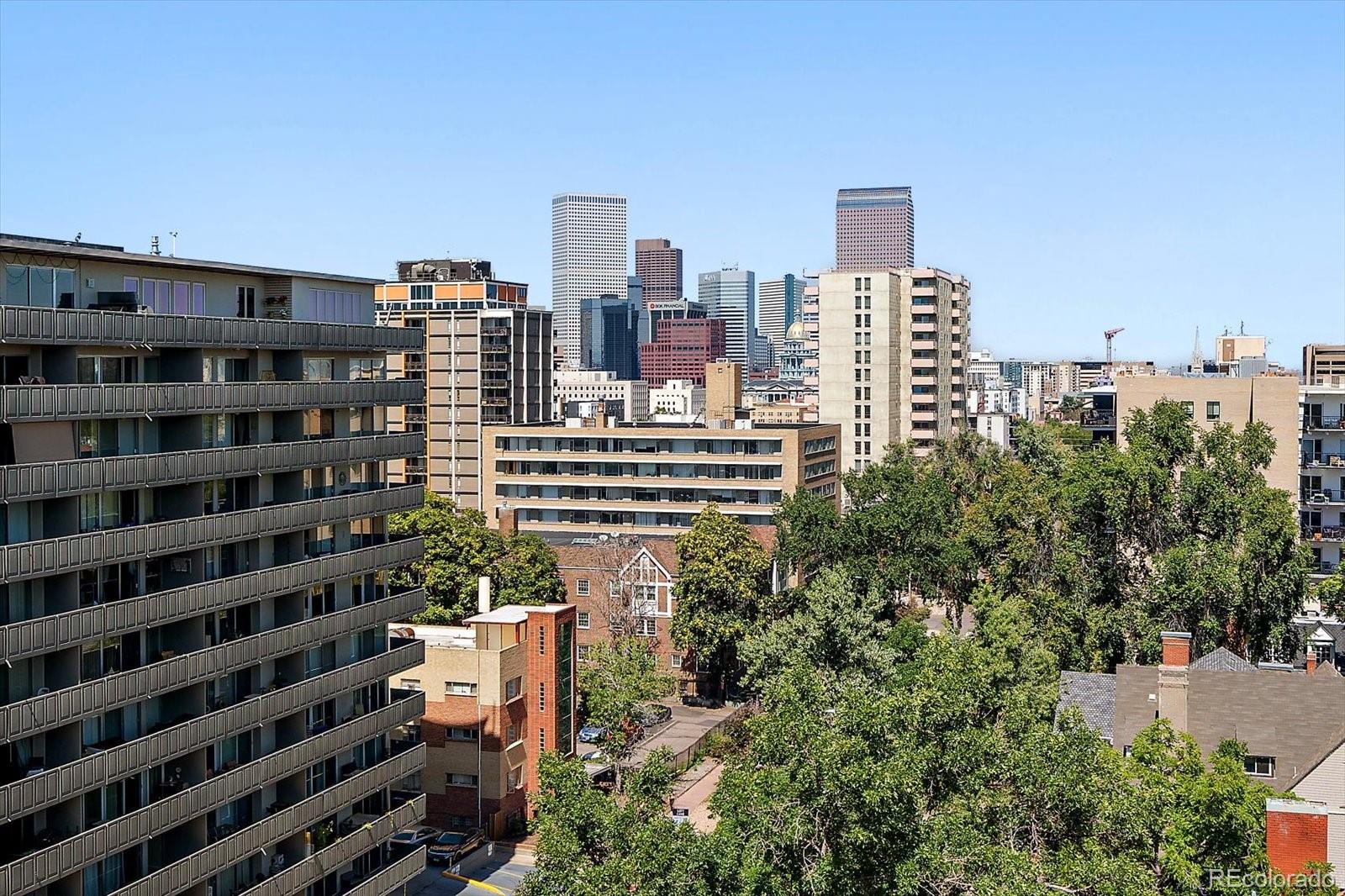 888 Logan Street, Unit 4F Denver, CO 80203 - Photo 18 of 21 a view of a city with tall buildings