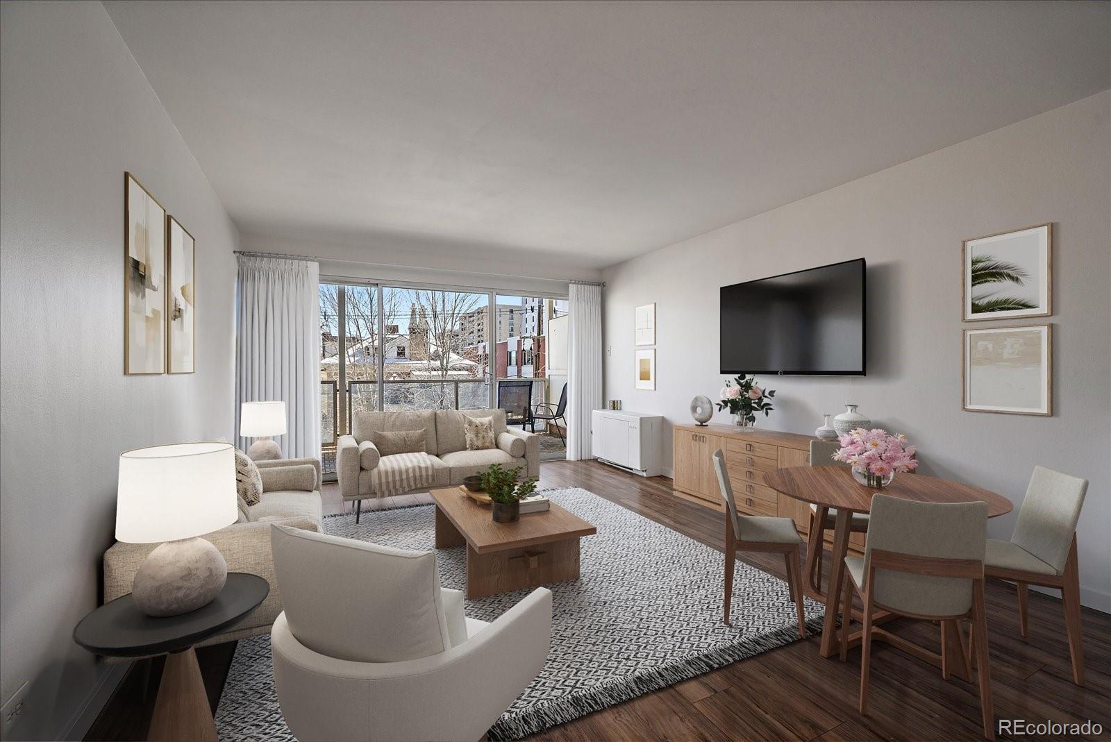 888 Logan Street, Unit 4F Denver, CO 80203 - Photo 3 of 21 a living room with furniture and a flat screen tv