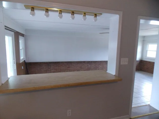 a view of staircase with wooden floor